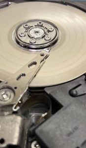 media damage shown as circular/radial scoring